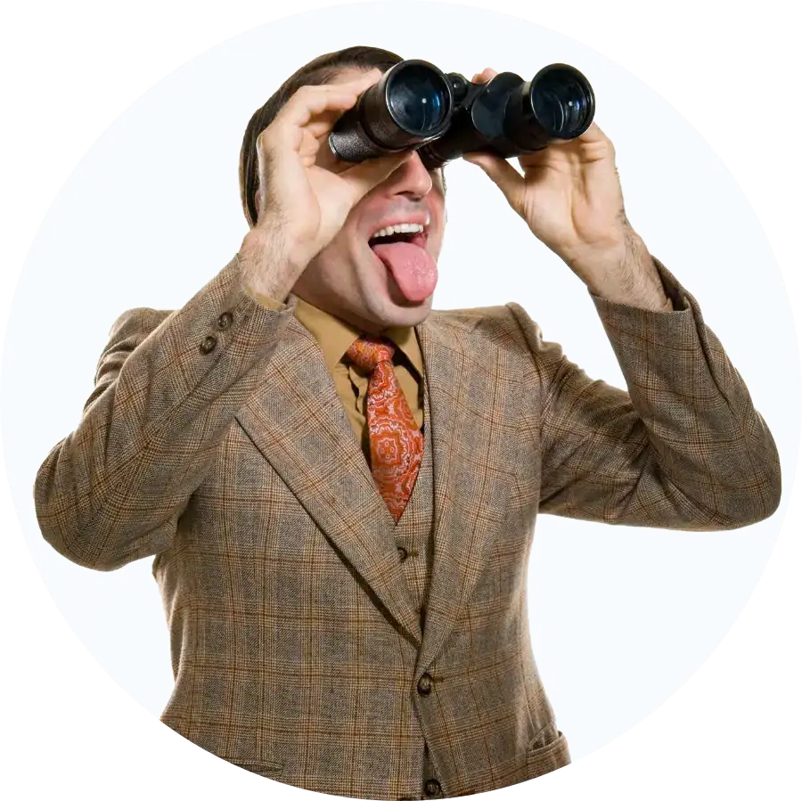 Man looking through binoculars