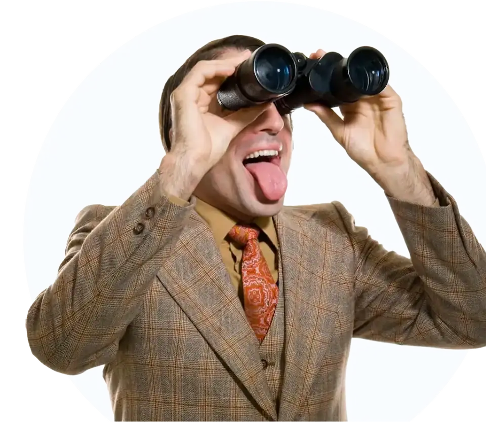 a man looking through binoculars